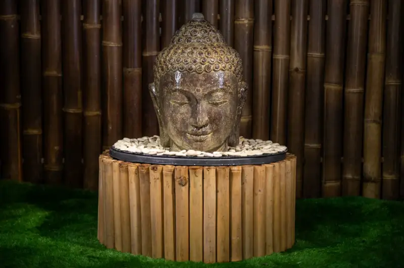 Product image 1 of the product “Buddha head as a water feature, 28x23x34cm, cast stone, hollow, handcrafted & coloured 30 cm”